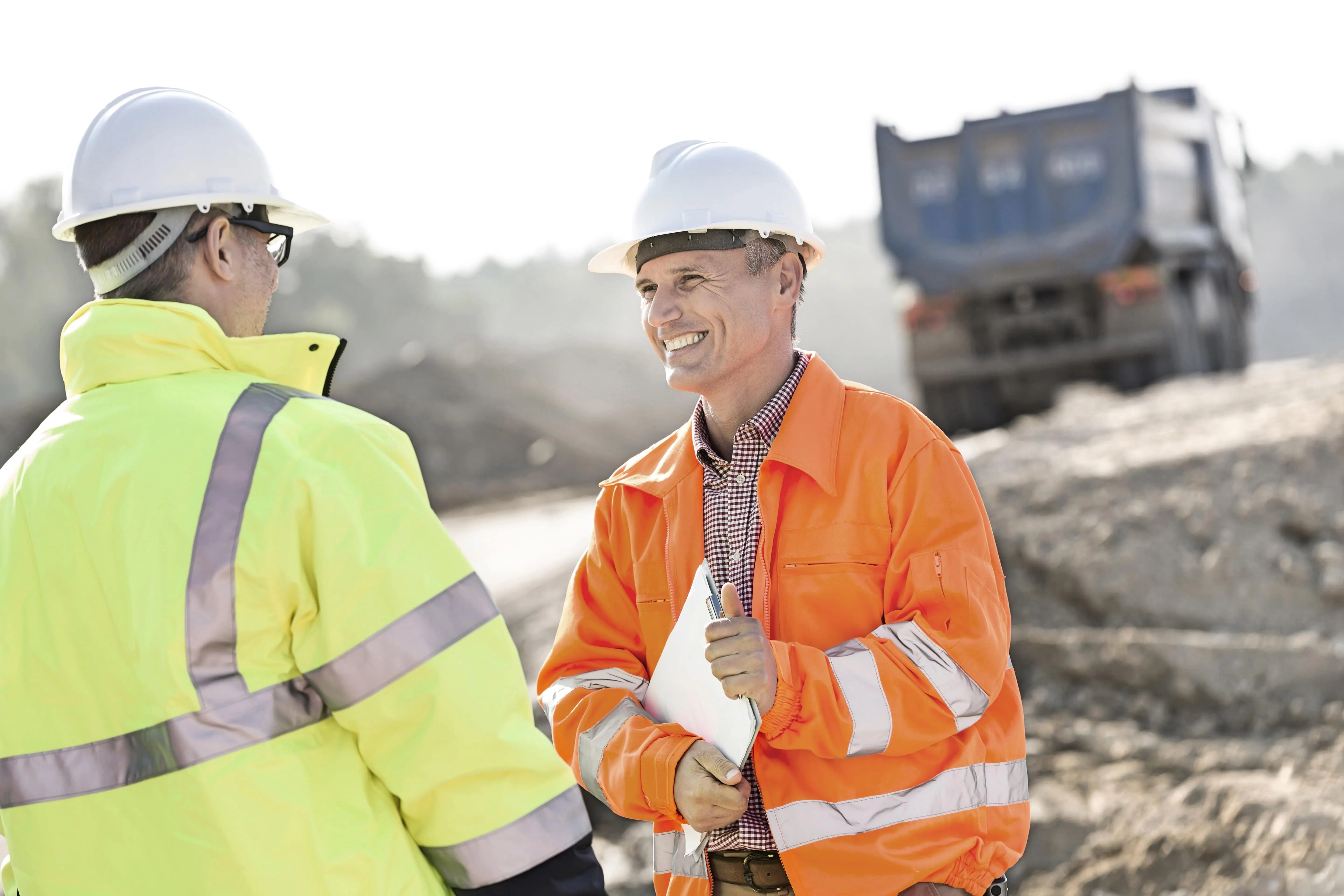 Two Workers Having A Stay Interview Min